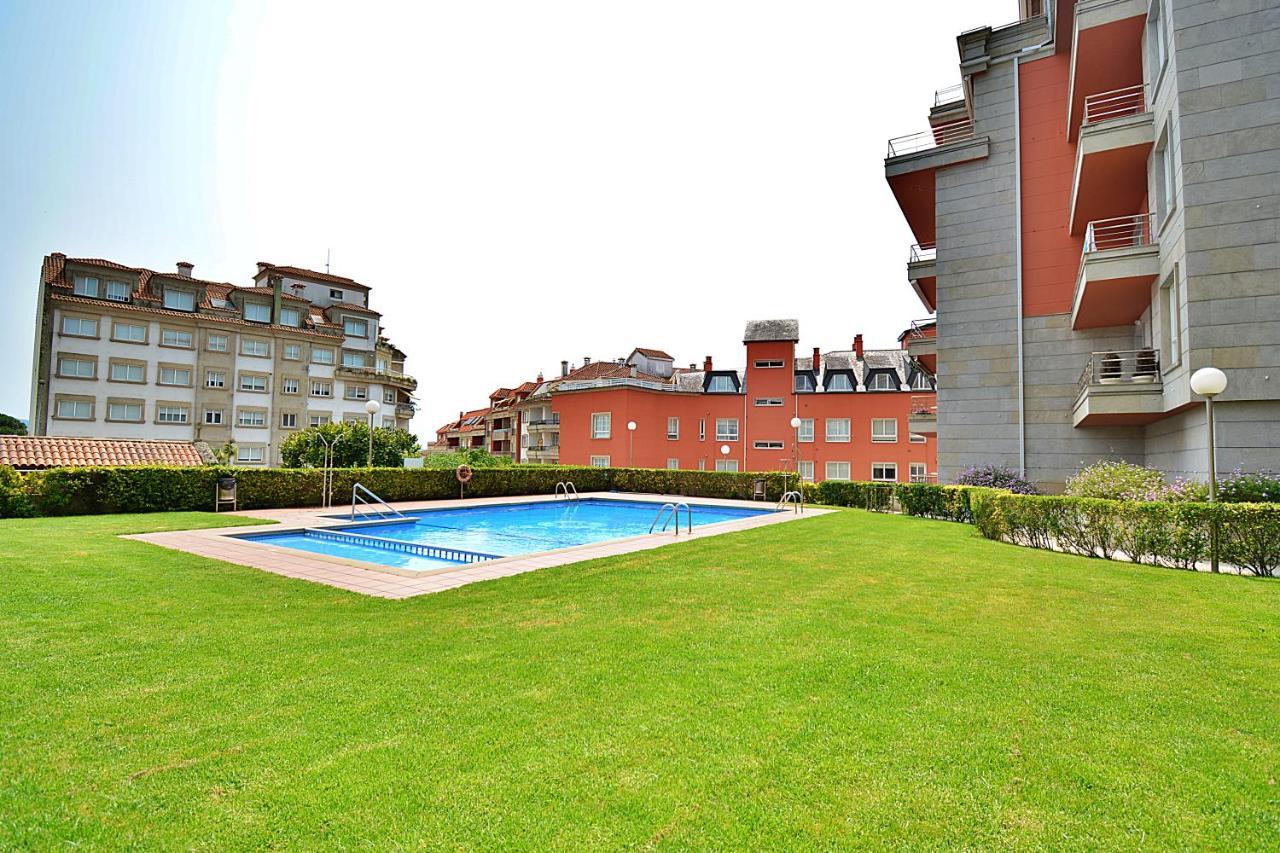 Galihost - Apartamento Con Piscina En El Centro De Sanxenxo Eksteriør billede